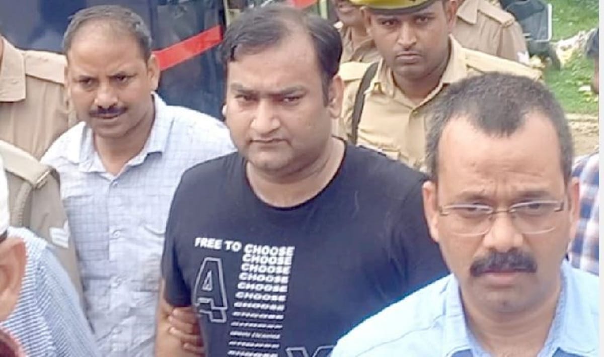 Former mla vijay mishra son Vishnu Mishra appears in varanasi court for threatening rape victim