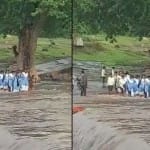 जान जोखिम में डालकर स्कूल जा रही छात्राएं।