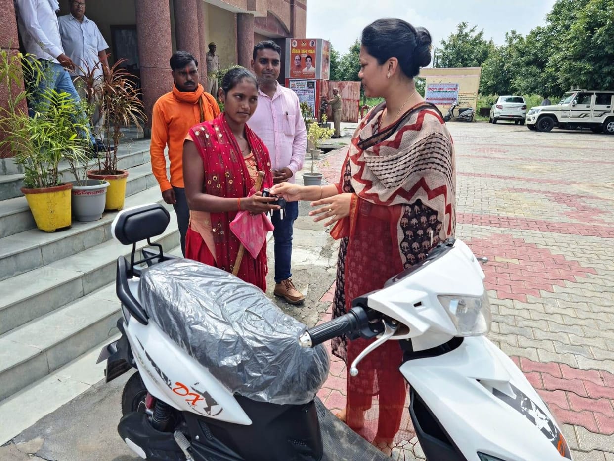 DM gave electronic scooty to a differently-abled girl