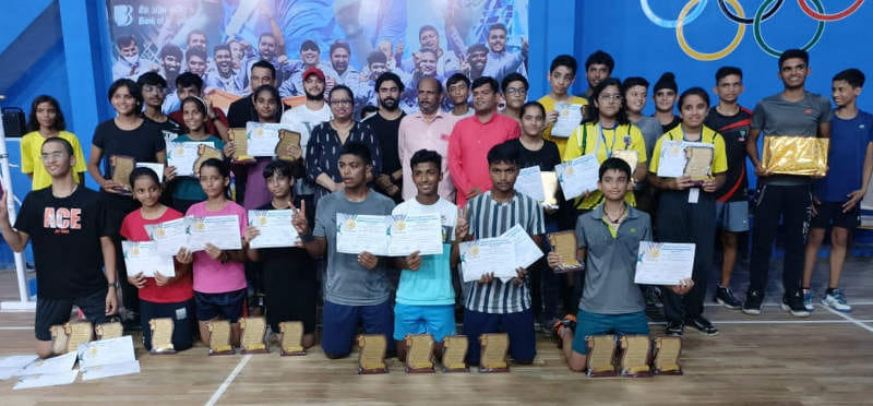 Exciting matches in district badminton competition
