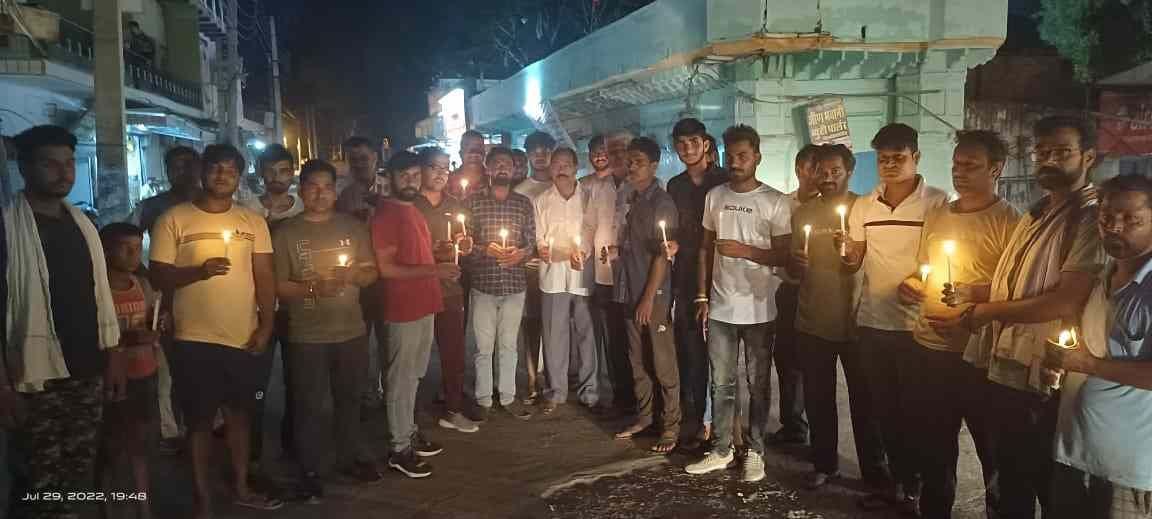 Candle march taken out in protest against the murder of BJP leader