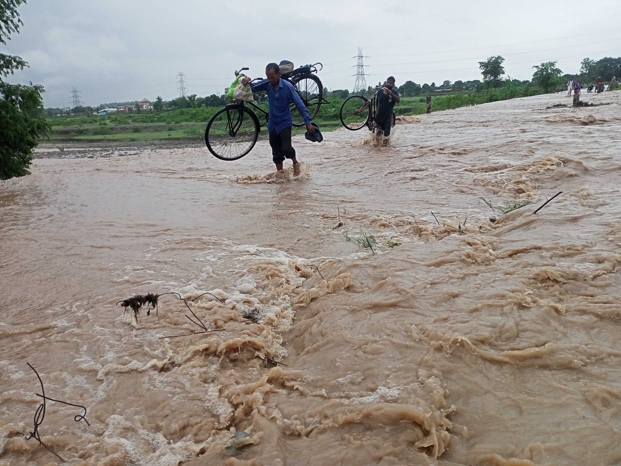 The overflowing drains stopped the path of the devotees of Purnagiri Dham