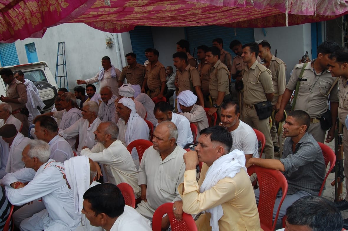 Shalini group held a meeting in front of the building
