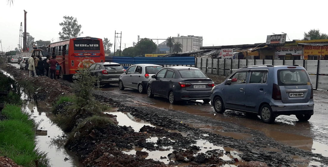 Poklane machine damaged, jammed on the highway