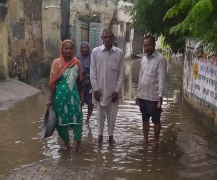 Dirty water accumulated in the streets of the village due to lack of drainage
