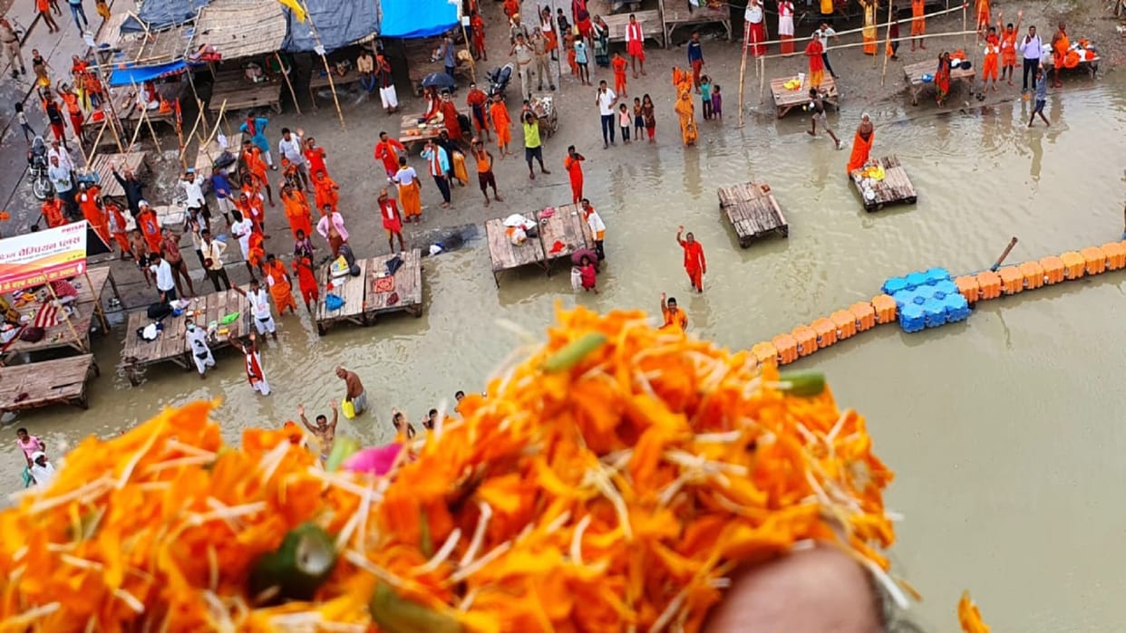 Flowers showered on the kanwariya by helicopter
