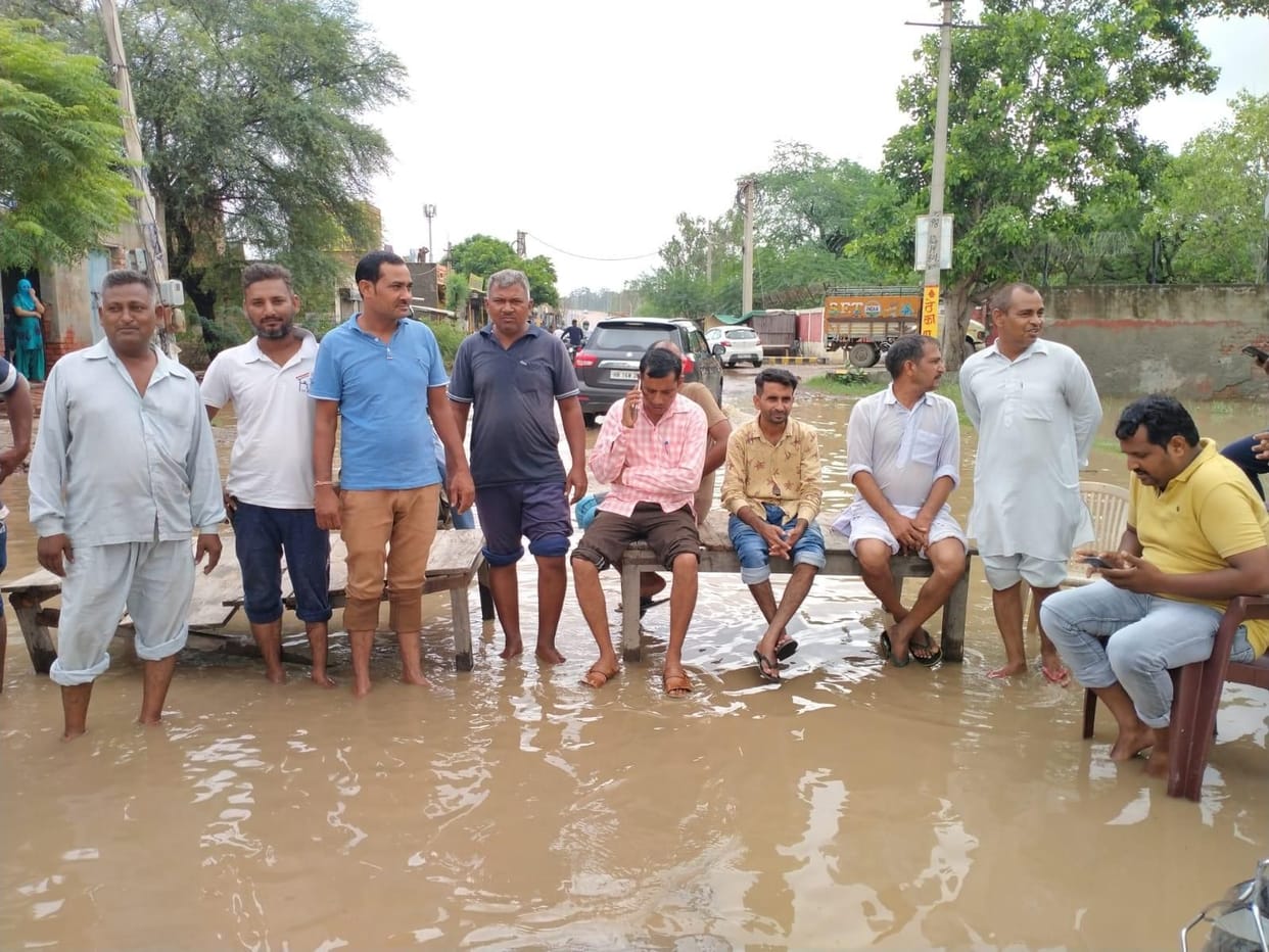 Villagers jammed the road demanding evacuation