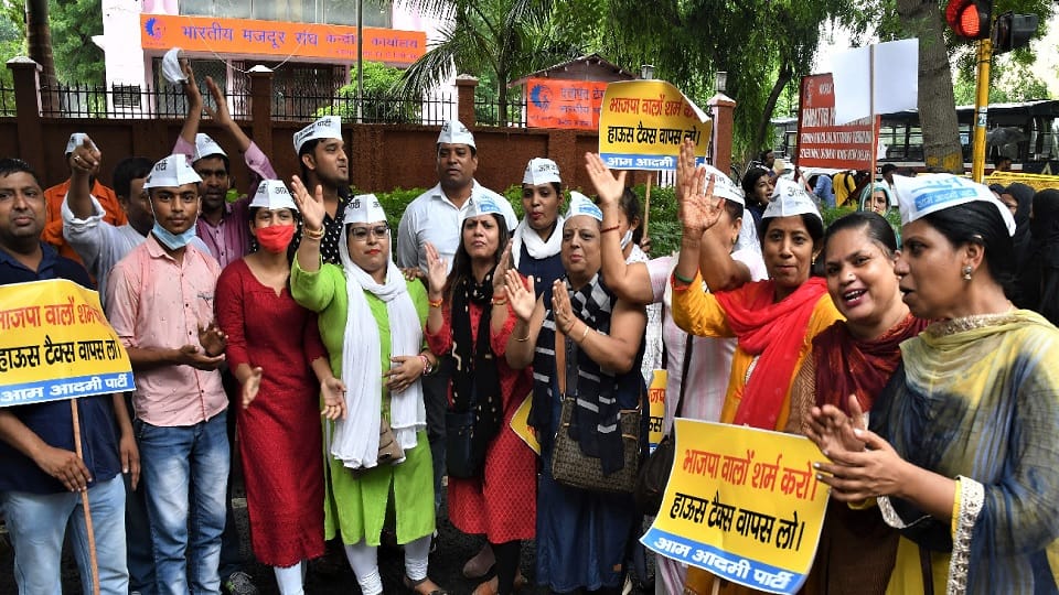 Aam Aadmi Party took to the road in protest against the decision to increase property tax