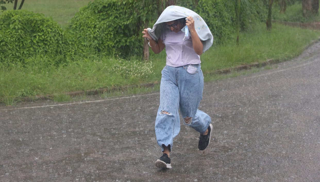 Candidates, officials and student organizations who came to take PU CET exam in heavy rain helped