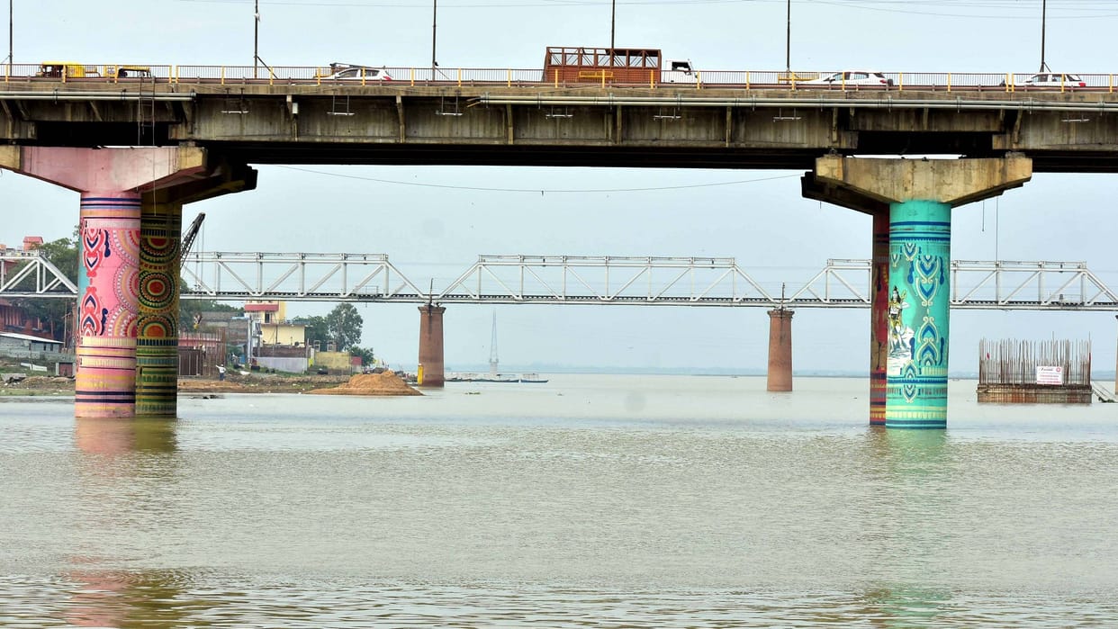 Wells under construction of rail bridge submerged due to rise in water level of Ganga
