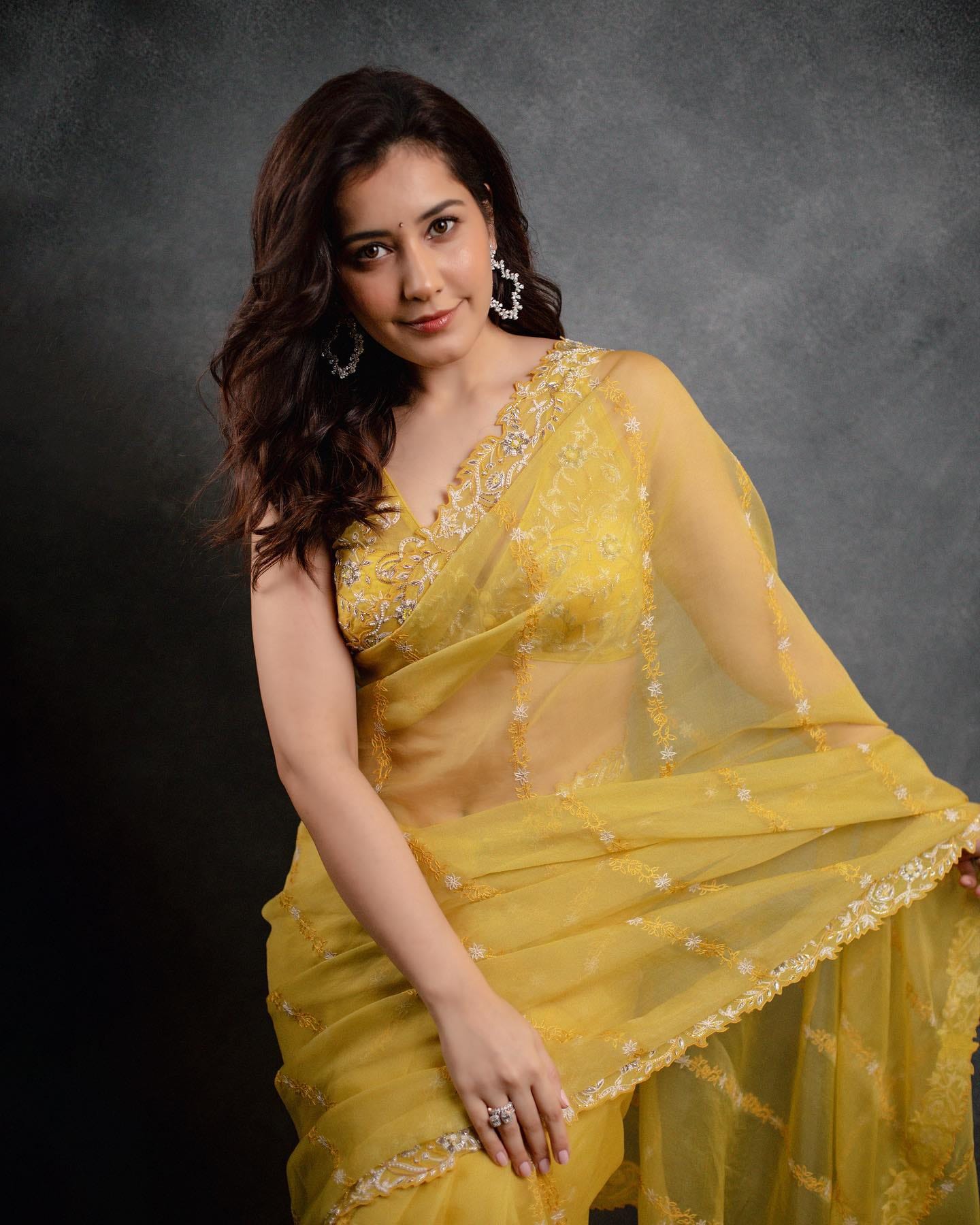 South Actress raashi khanna shared her latest photos in golden yellow saree picture went viral on internet