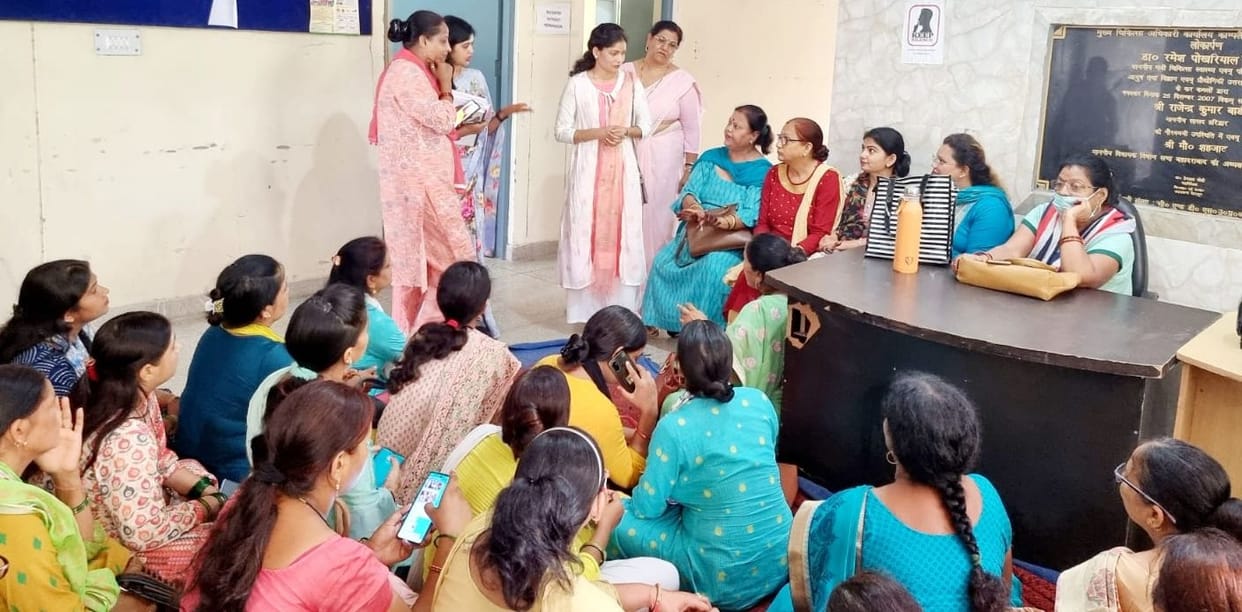 Women health workers surrounded CMO office