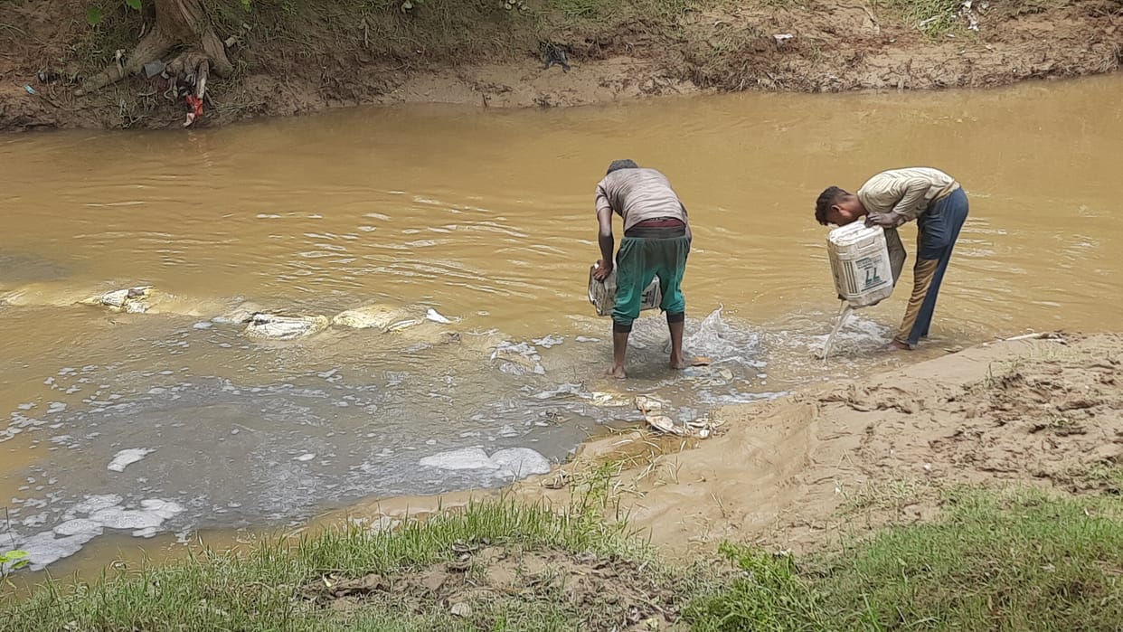 Remains from the firecracker factory flowing in the river