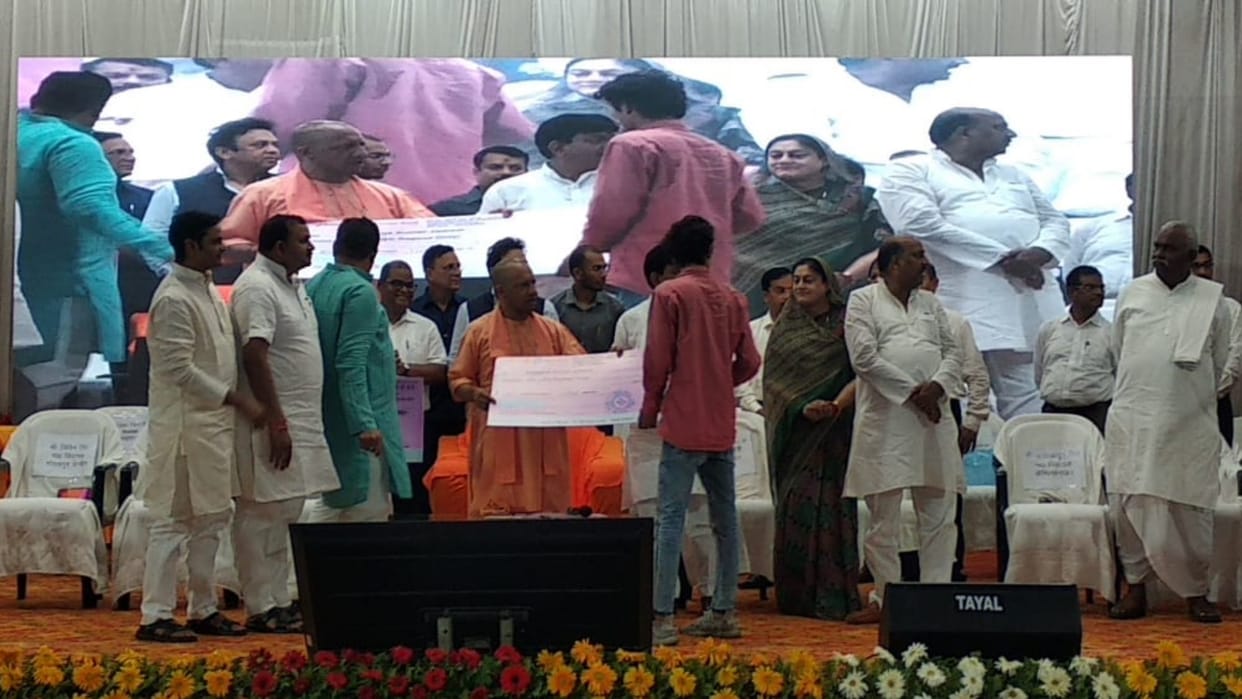 CM Yogi given appointment letter in MMMUT Rojgar Mela