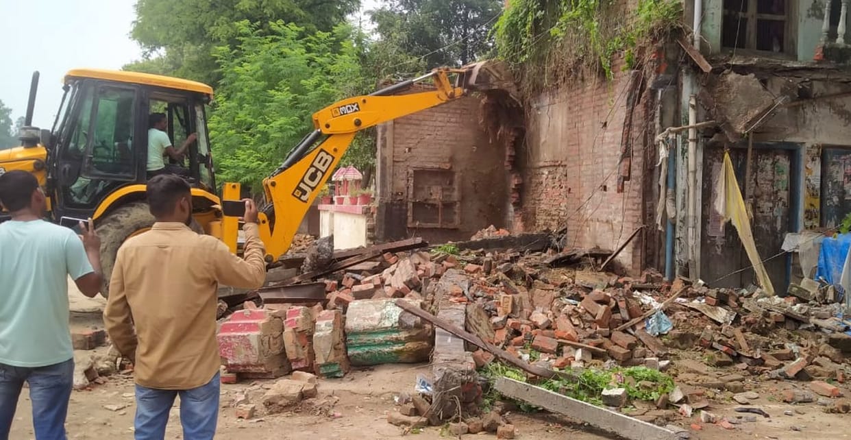 Bulldozer demolished three houses