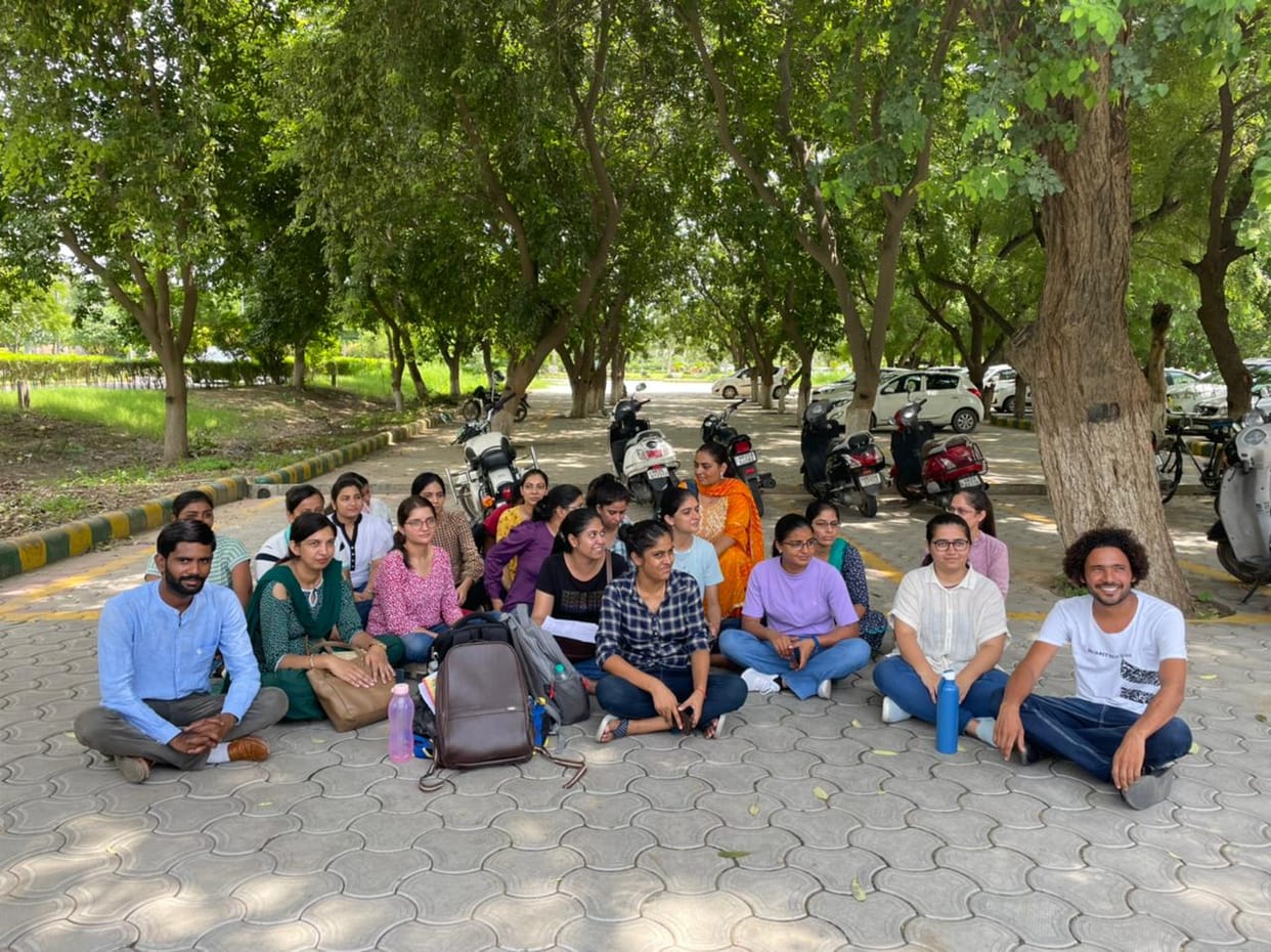 PhD students sitting on dharna for not getting permanent room in GJU hostel