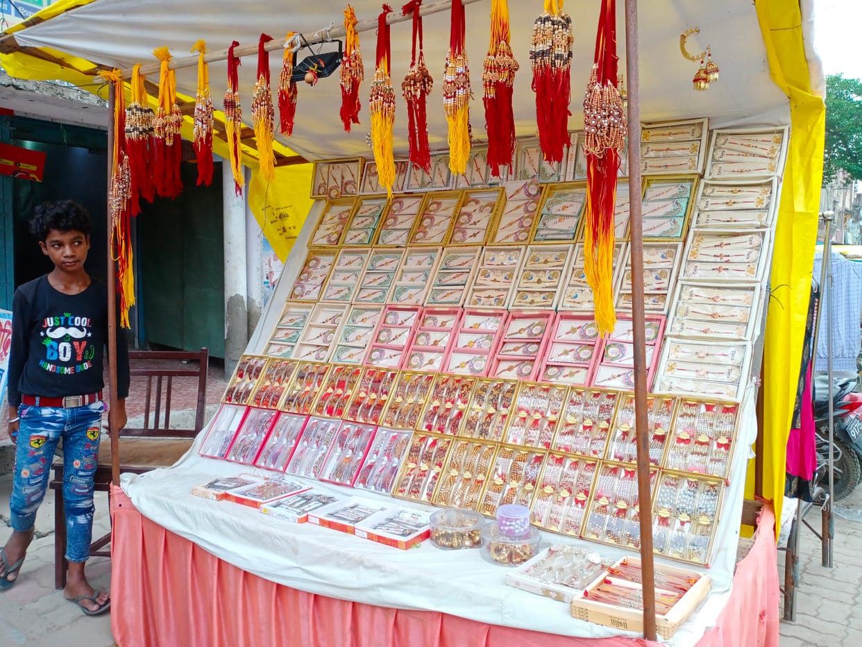 Market decorated with rakhis, hit by inflation