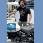 Royal Enfield CEO Sid Lal showcasing upcoming Hunter 350 motorcycle