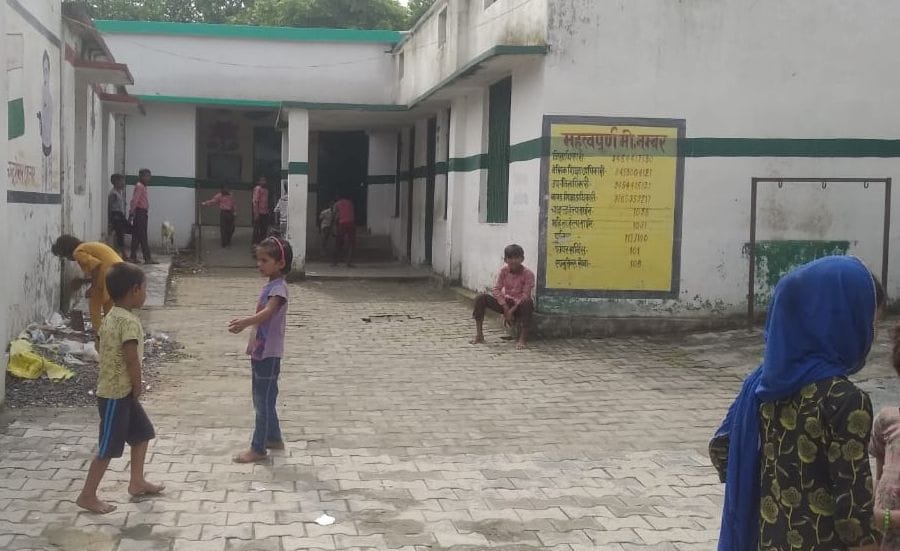Teacher absent -students are playing  in complex