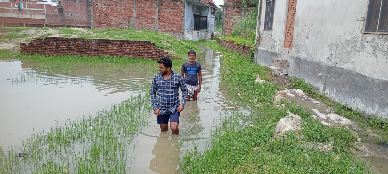 Compulsion to reach home through knee-filled water