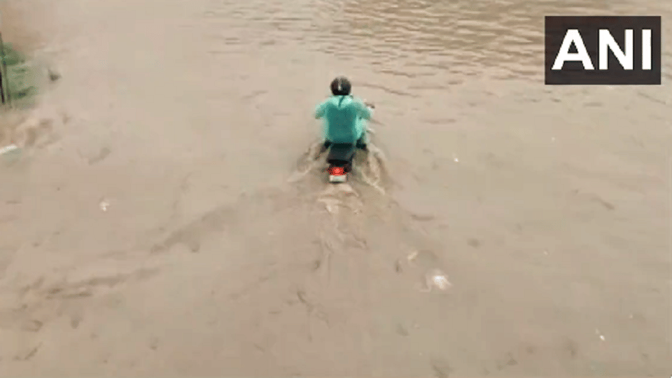 Roads submerged after rain in Gurugram twowheelers half visible
