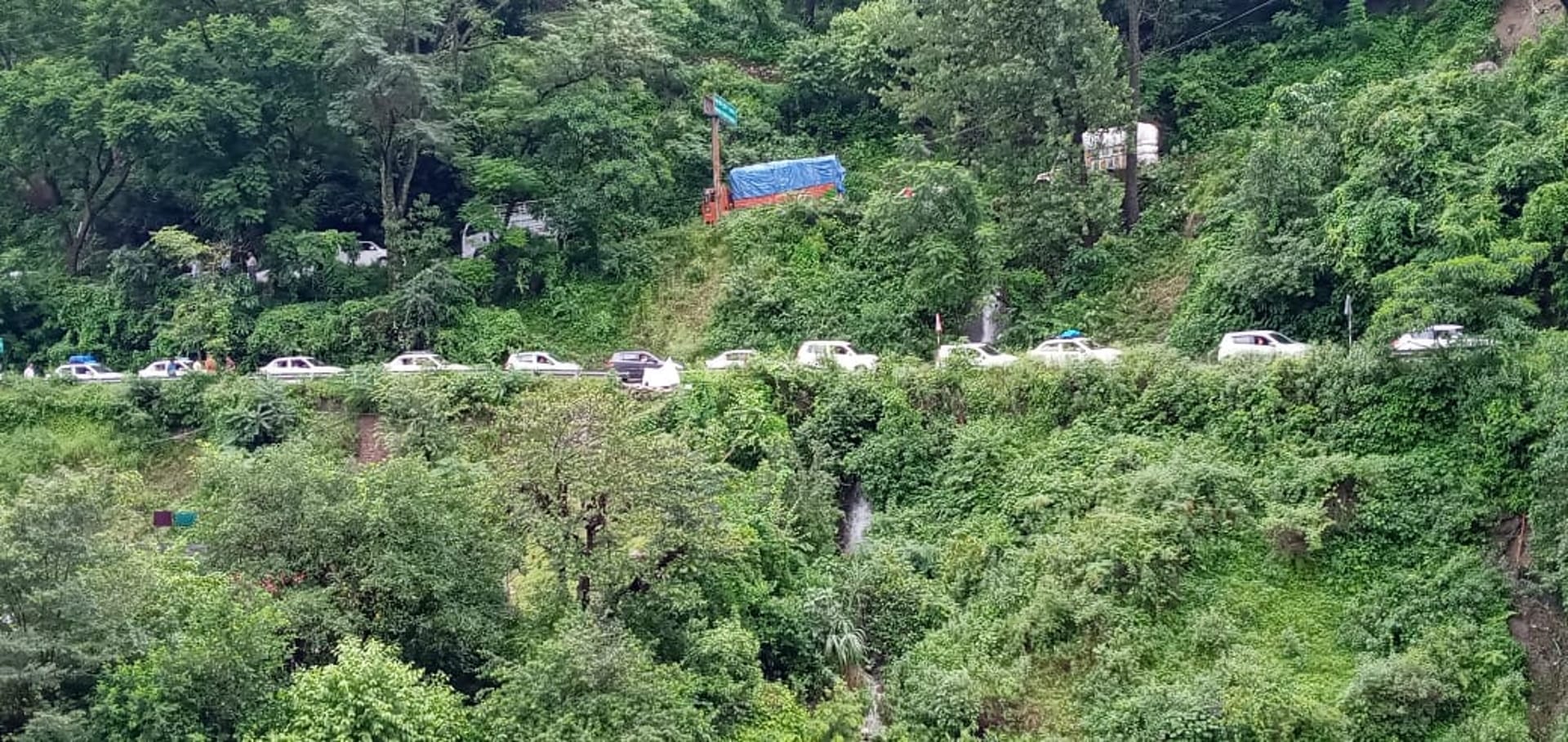 Landslide in karnprayag Uttarakhand Weather car buried in debris vehicles stuck
