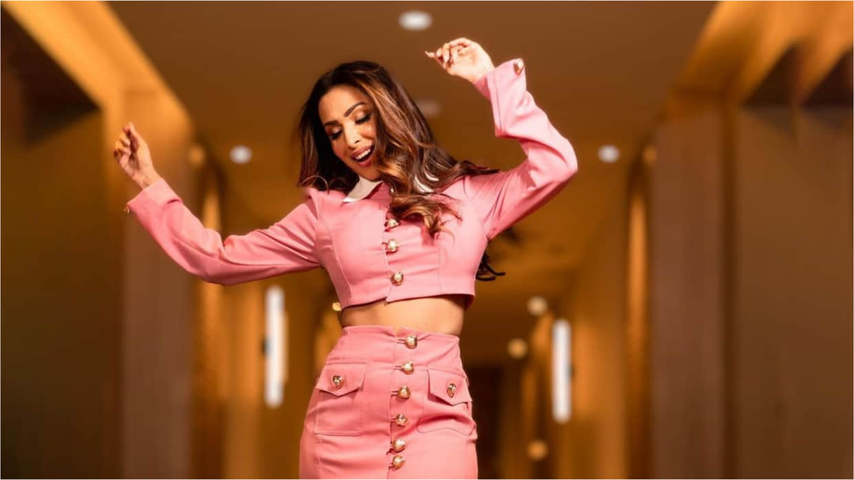 malaika arora pink crop top and mini skirt worth 19k looking super stylish
