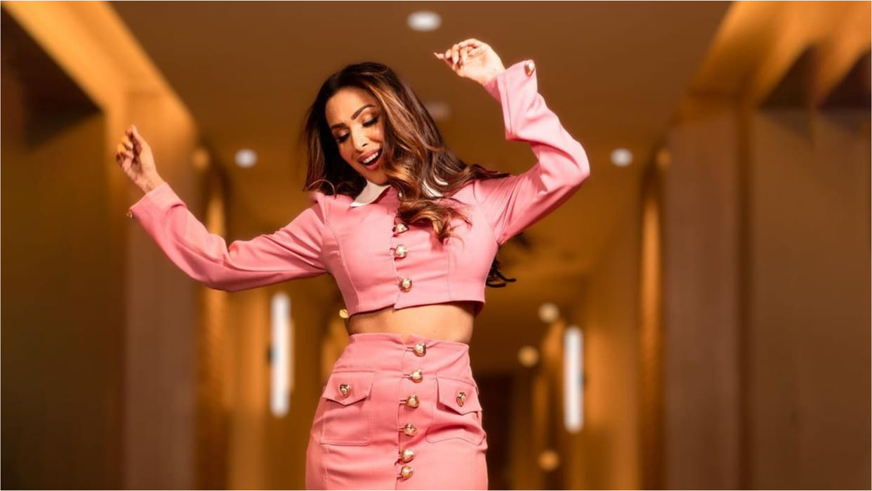 malaika arora pink crop top and mini skirt worth 19k looking super stylish