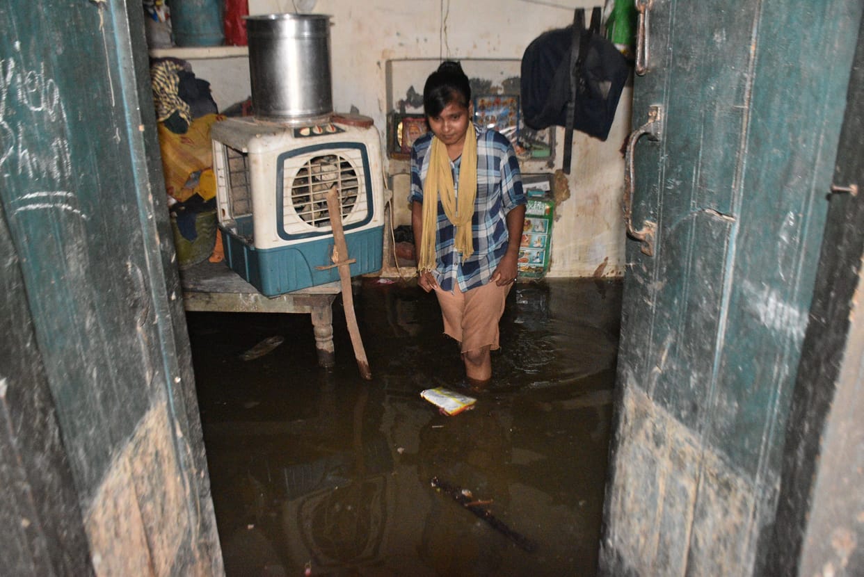 In Etawah, roads were submerged due to torrential rains and rain water filled the houses