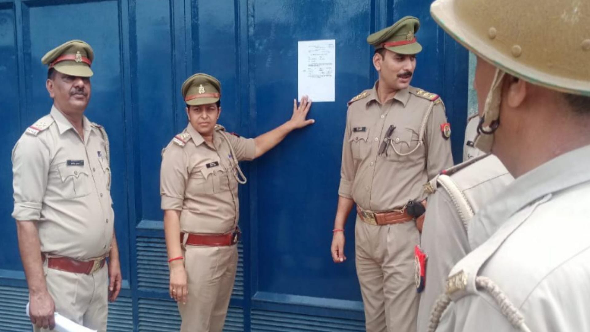 Police pasted non-bailable warrants at the house of former MLC Haji Iqbal and his brother-in-law