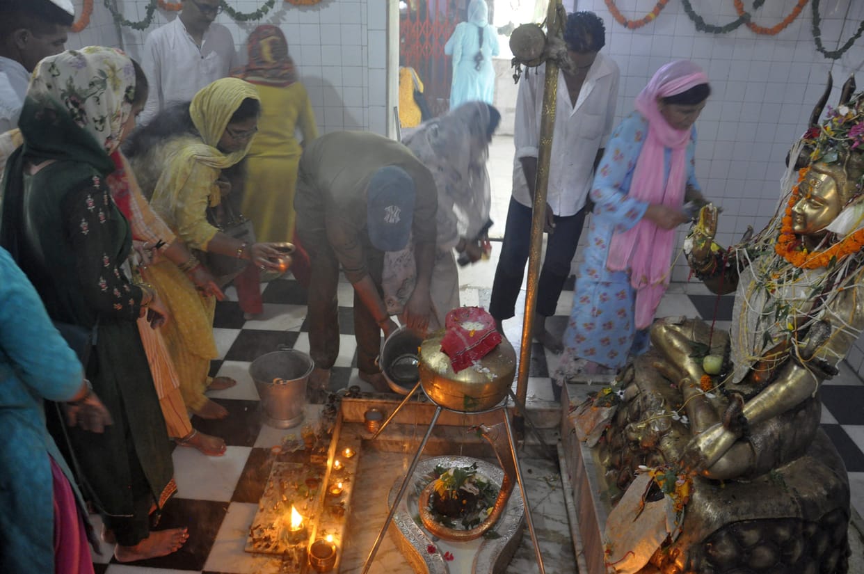 Devotees gathered in the temple to see Bhole Nath