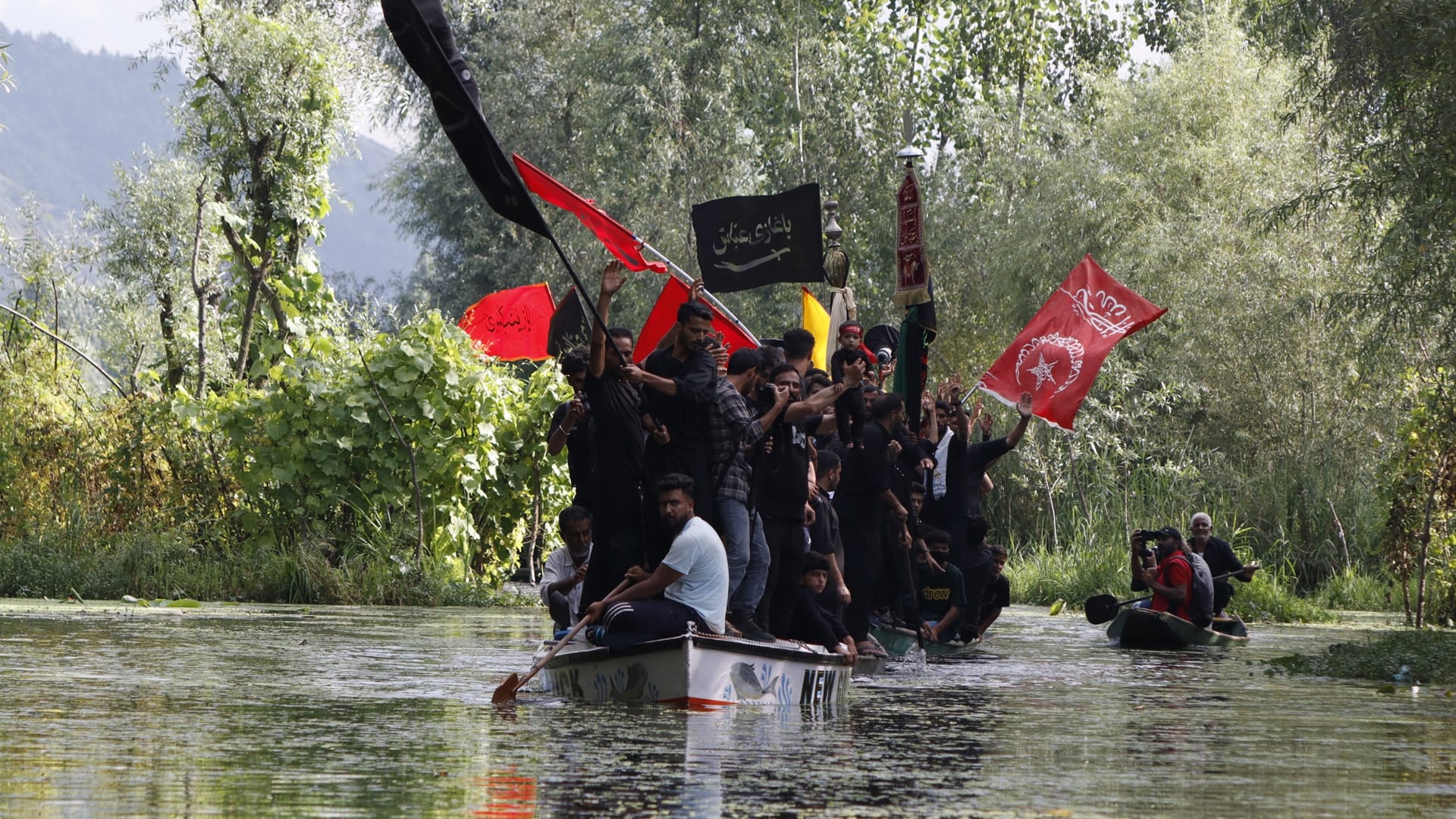 photos of Boat Rally organized In Dal Lake On Muharram 2022 in srinagar