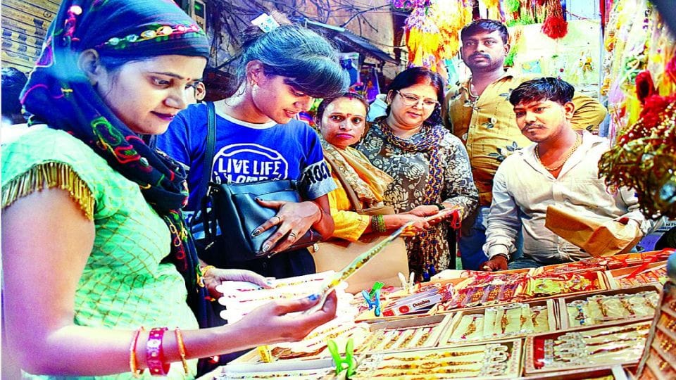 Bulldozer designed rakhis sell in agra markets