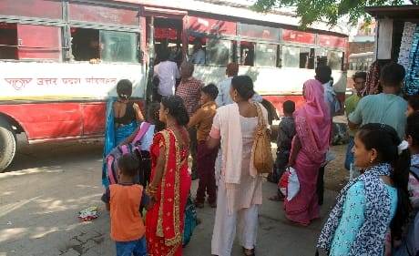 Crowd of women gathered at the festival, buses fell short