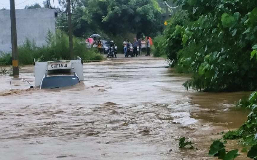 photos heavy rain in jammu kashmir flood  entered many houses water level of rivers