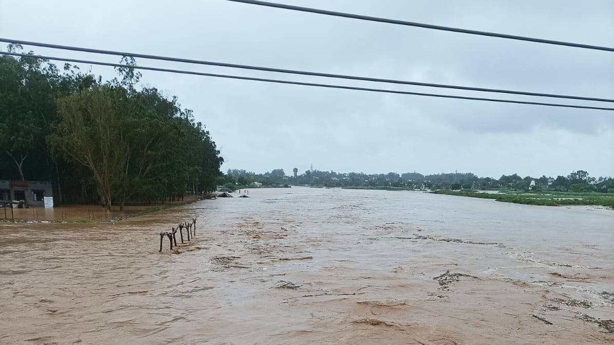 photos heavy rain in jammu kashmir flood  entered many houses water level of rivers