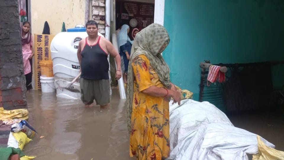photos heavy rain in jammu kashmir flood  entered many houses water level of rivers