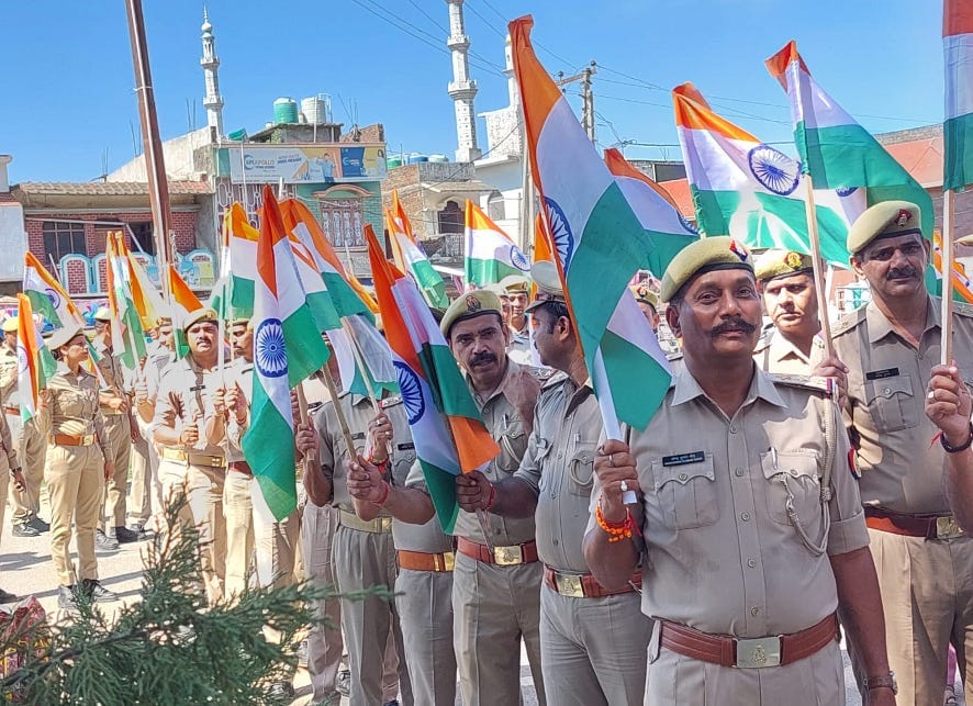 Police and Home Guard team took out tricolor rally