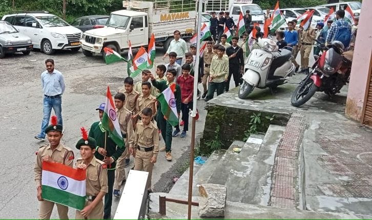 Students holding tricolor in hand