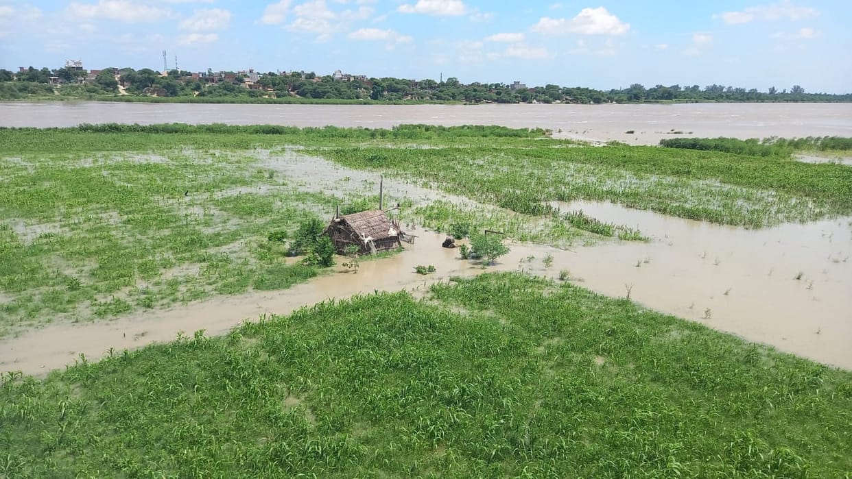 Water level at danger mark, farmers sleep