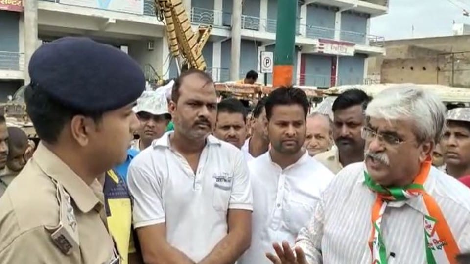 CM Yogi Adityanath face cut from hoarding of the Har Ghar Tiranga campaign in Firozabad
