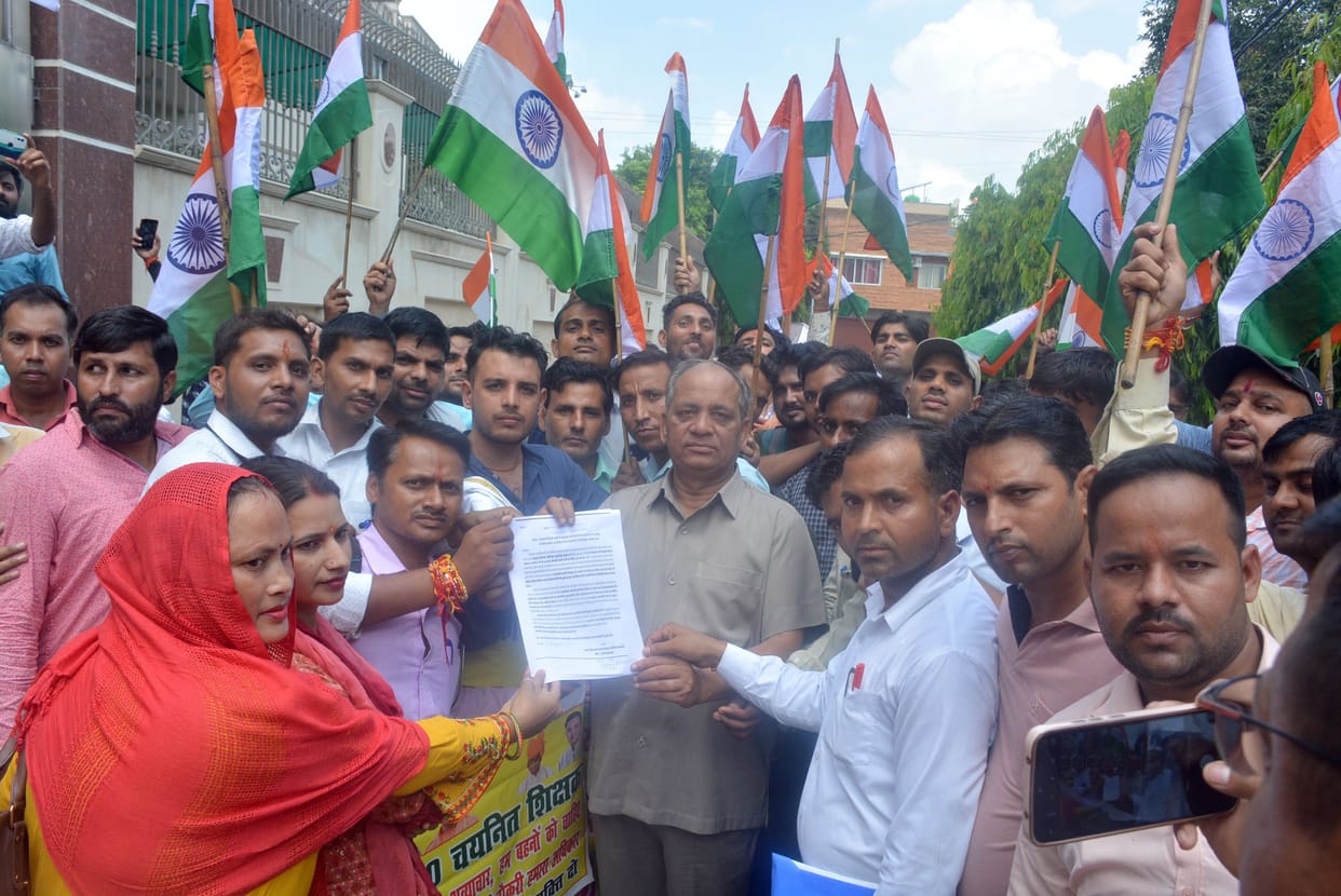 Protest outside the residence of Minister of State for Education