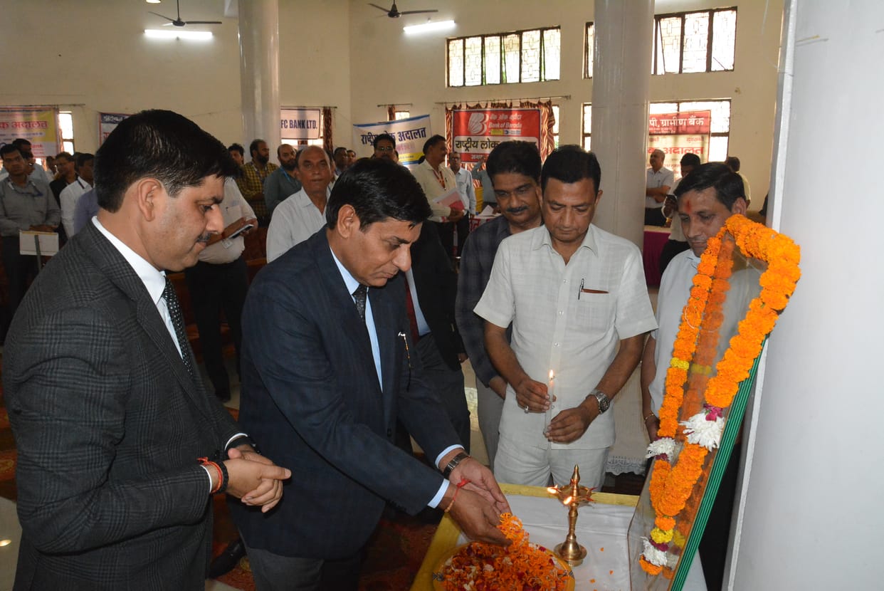 Record settlement of cases in National Lok Adalat