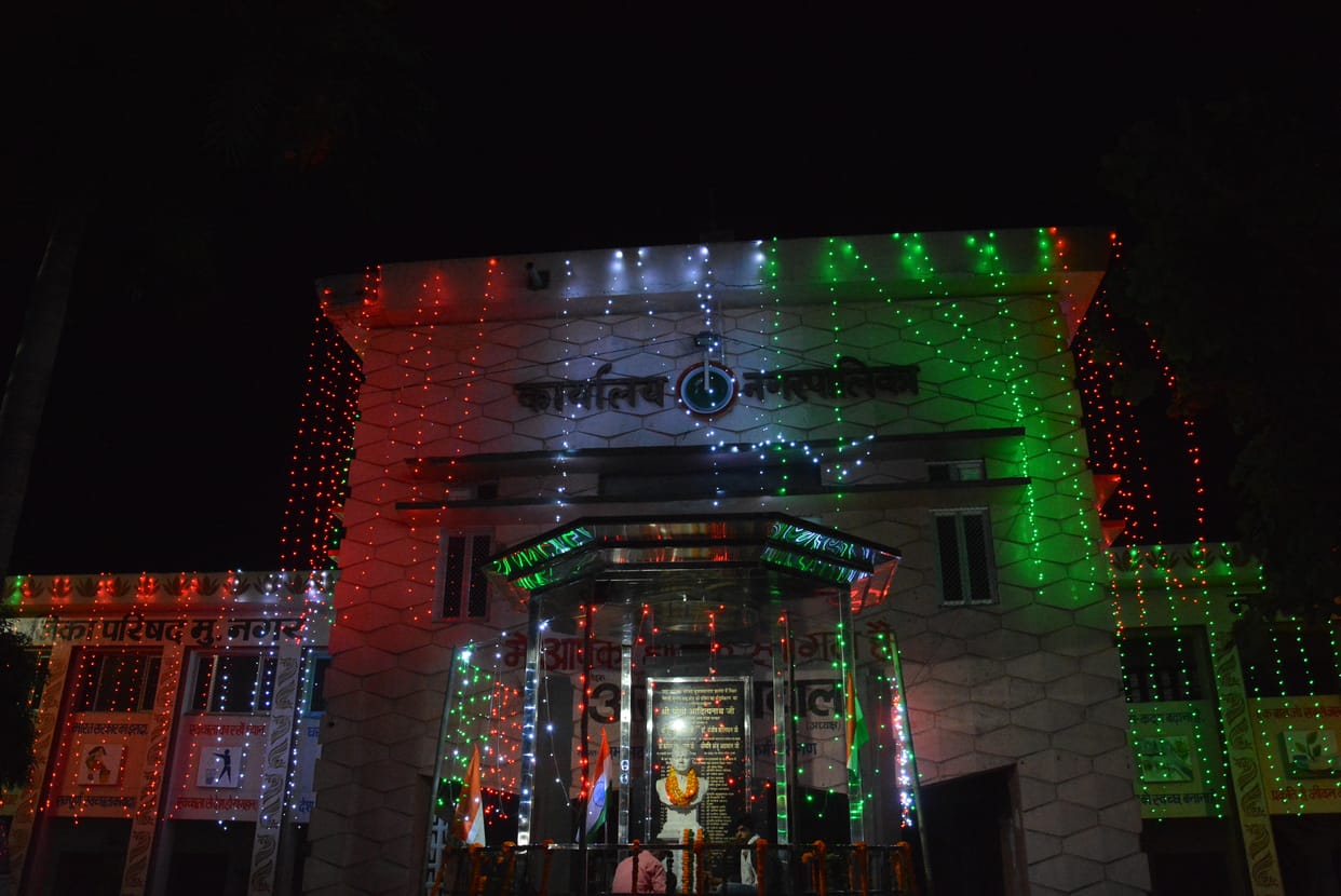 Buildings lit up with lights, patriotic tunes resonated