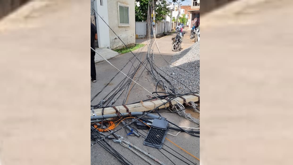 An electric poll falls down in Indira nagar in Lucknow.