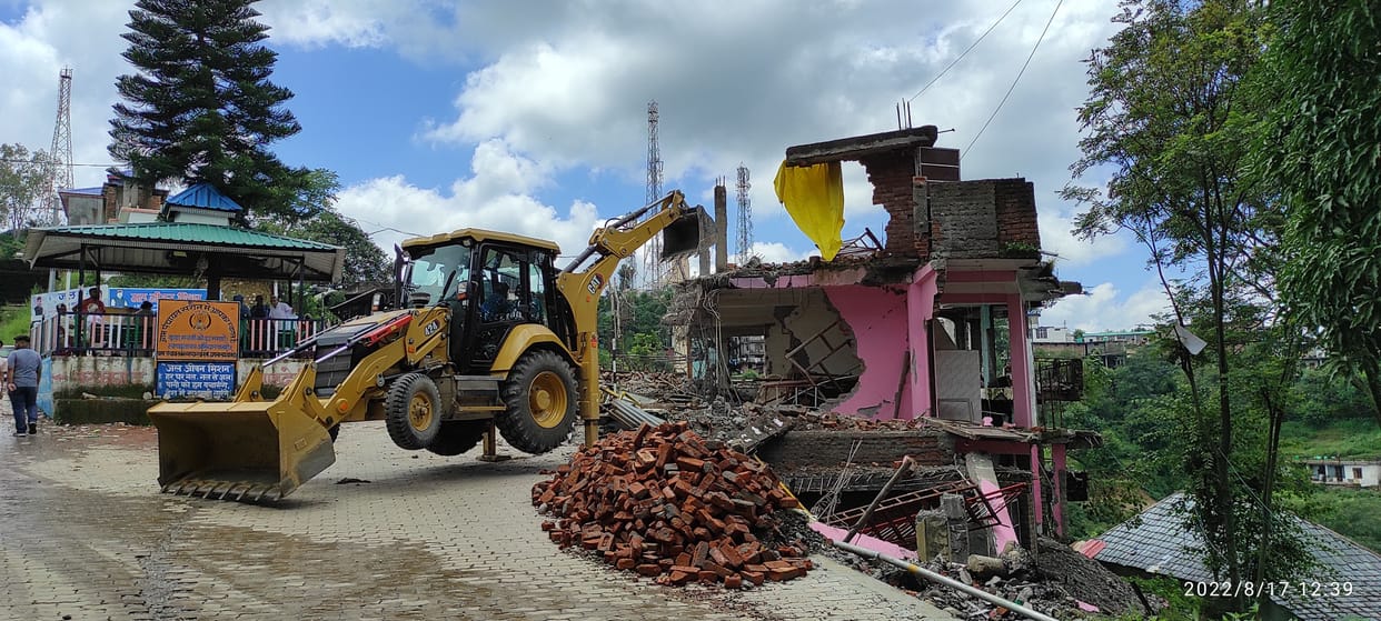 The houses coming under the JD of NH were broken with bulldozers
