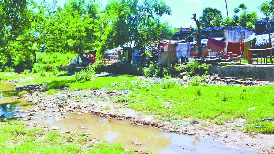 Polluted water falling in Sukhna Cho