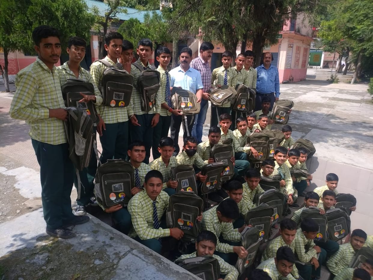 986 school bag distributed to students in dadhau  block sirmaur