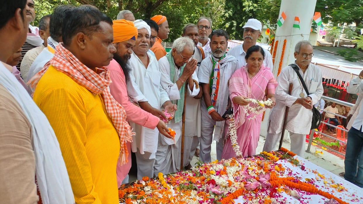 Flowers of reverence offered to the martyrs at the memorial