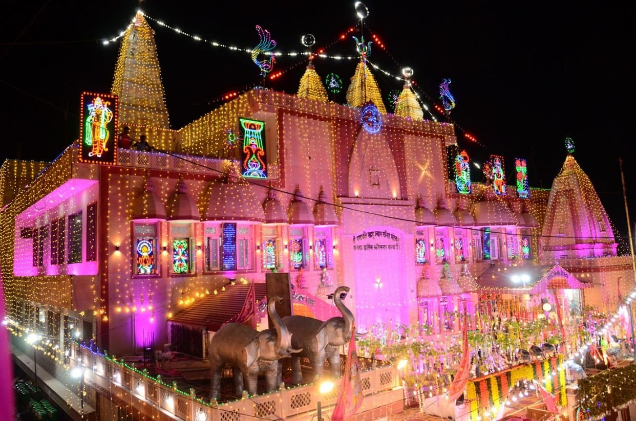Temple decorated, devotees immersed in the devotion of Kanha